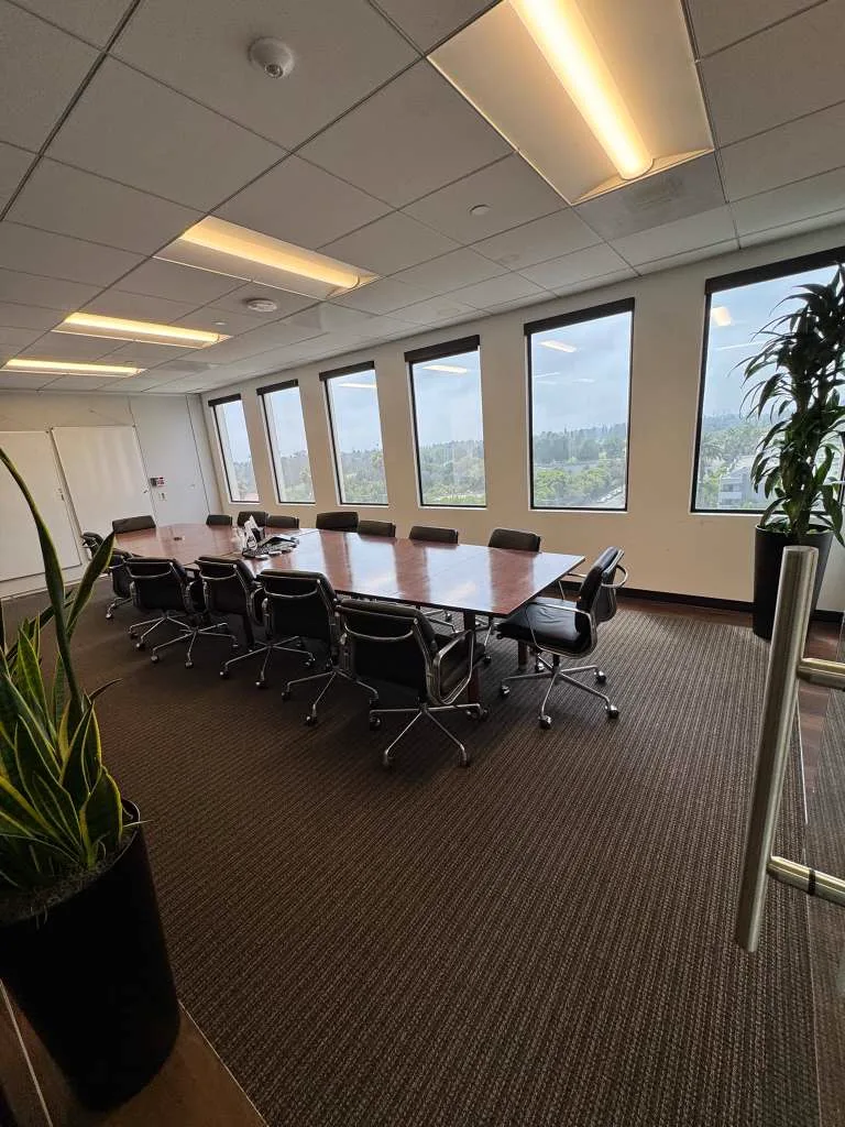 Office boardroom carpet cleaned around the conference table