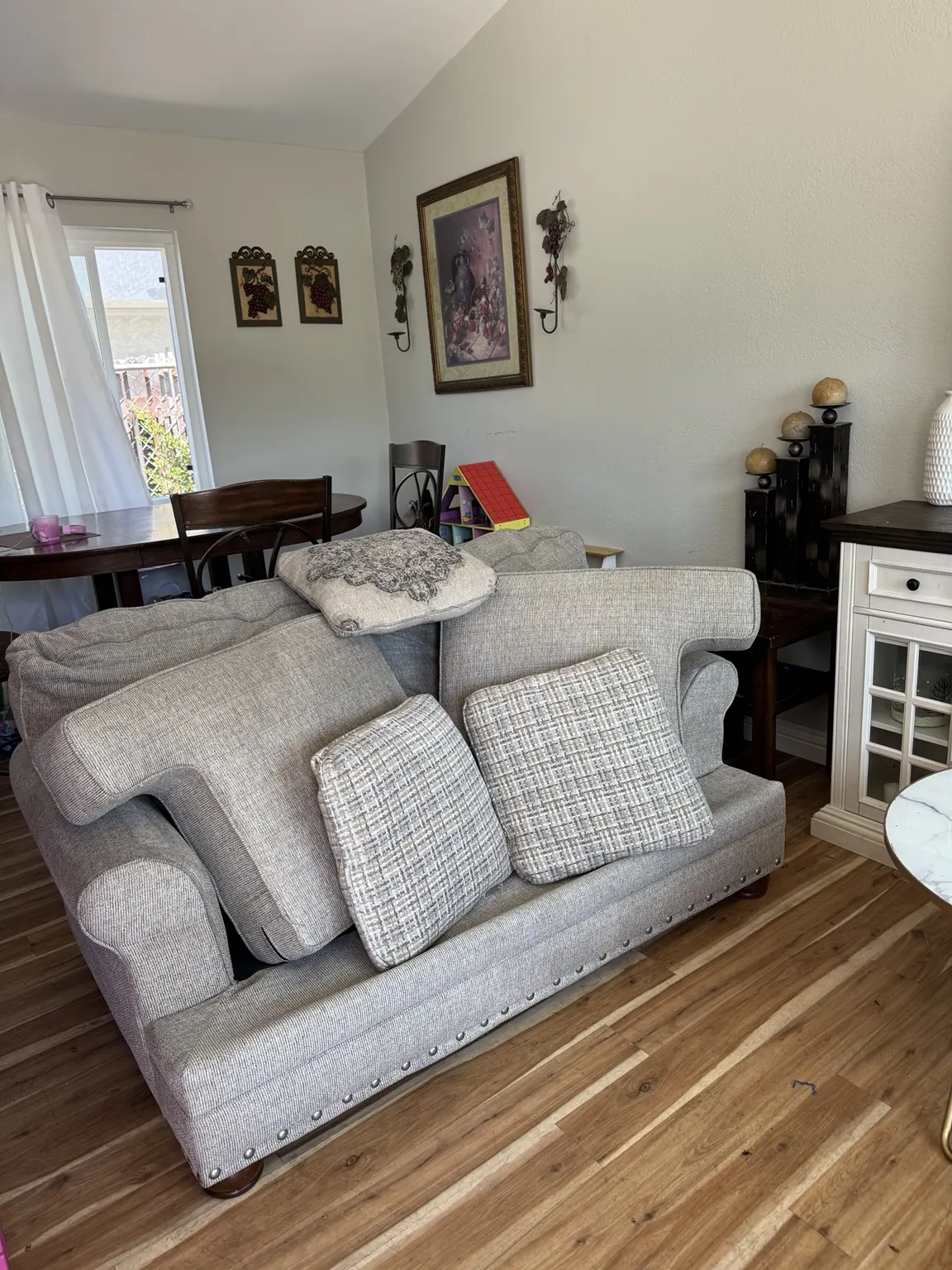 Patterned loveseat and armchair after cleaning