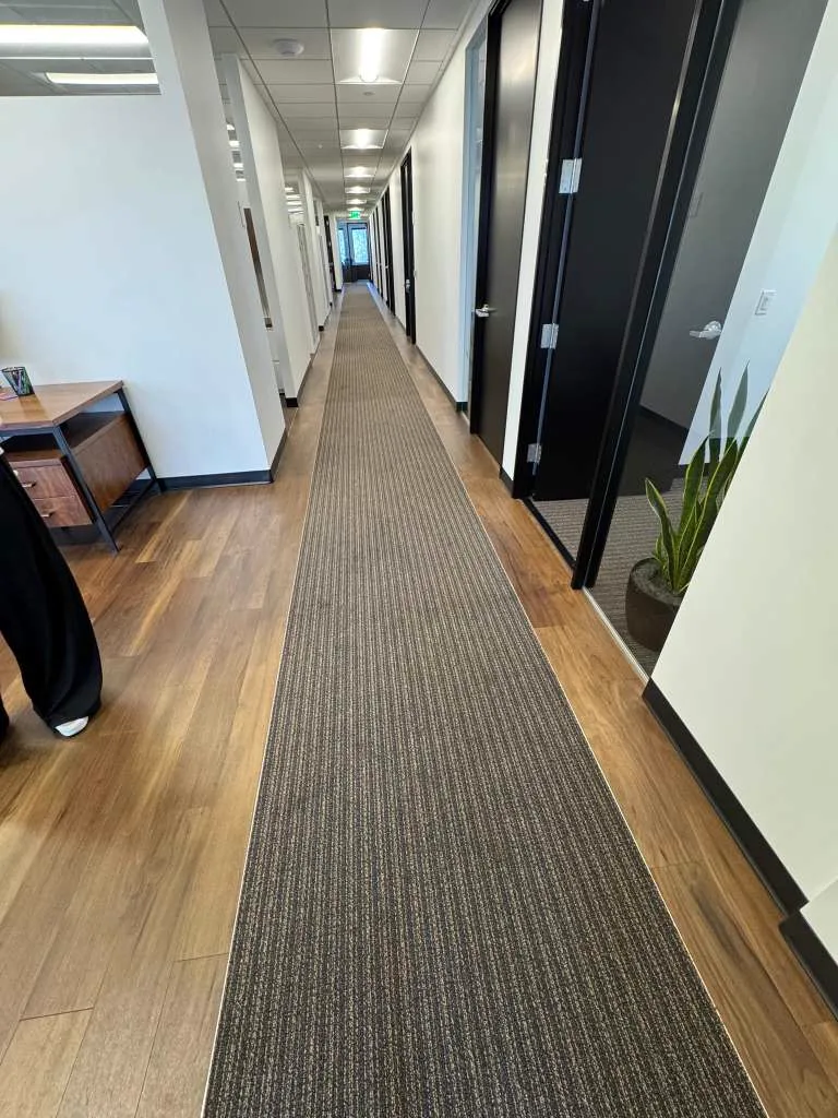 Office corridor carpet runner after commercial carpet cleaning