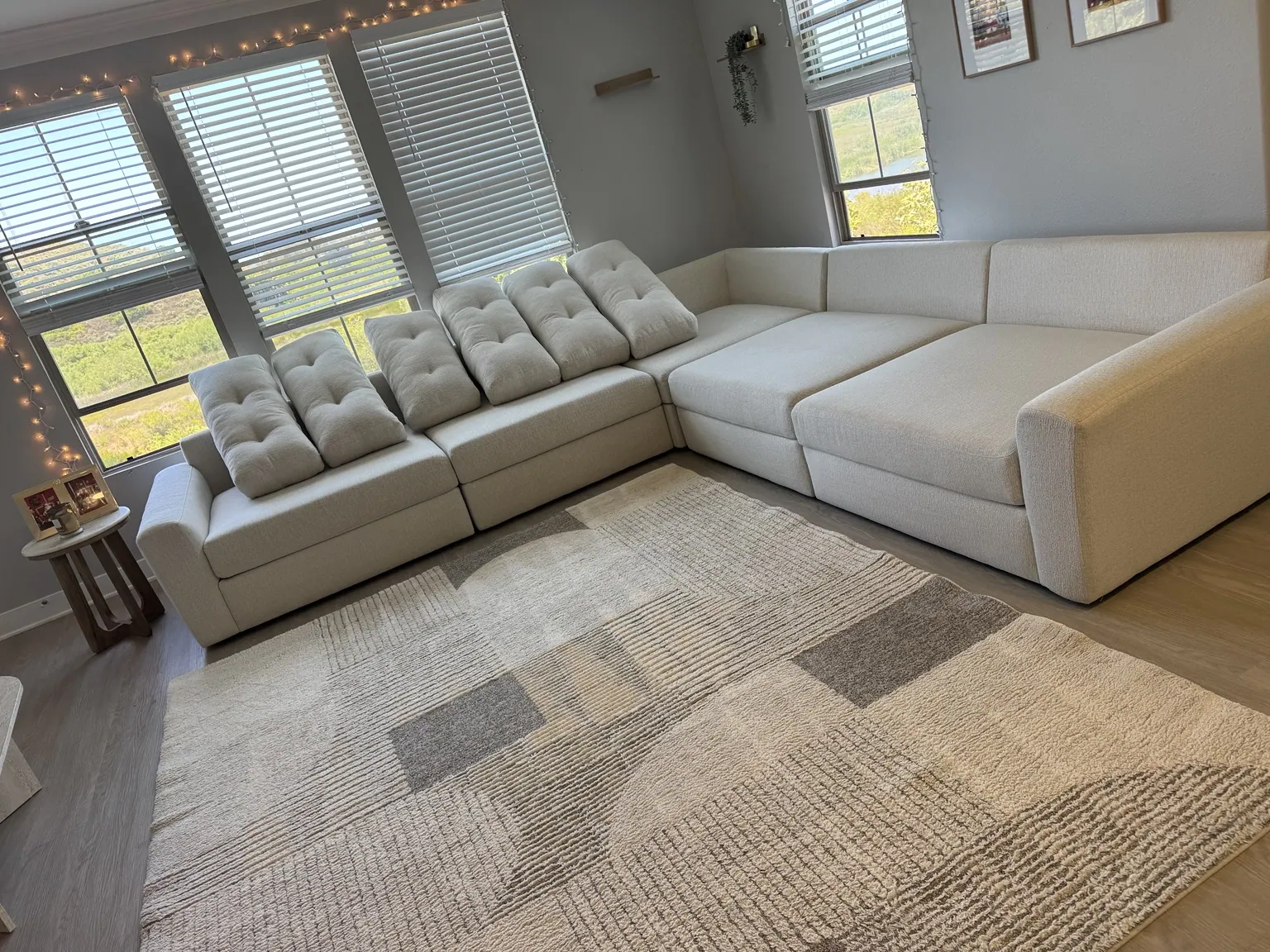 Large light sectional cleaned in a living room