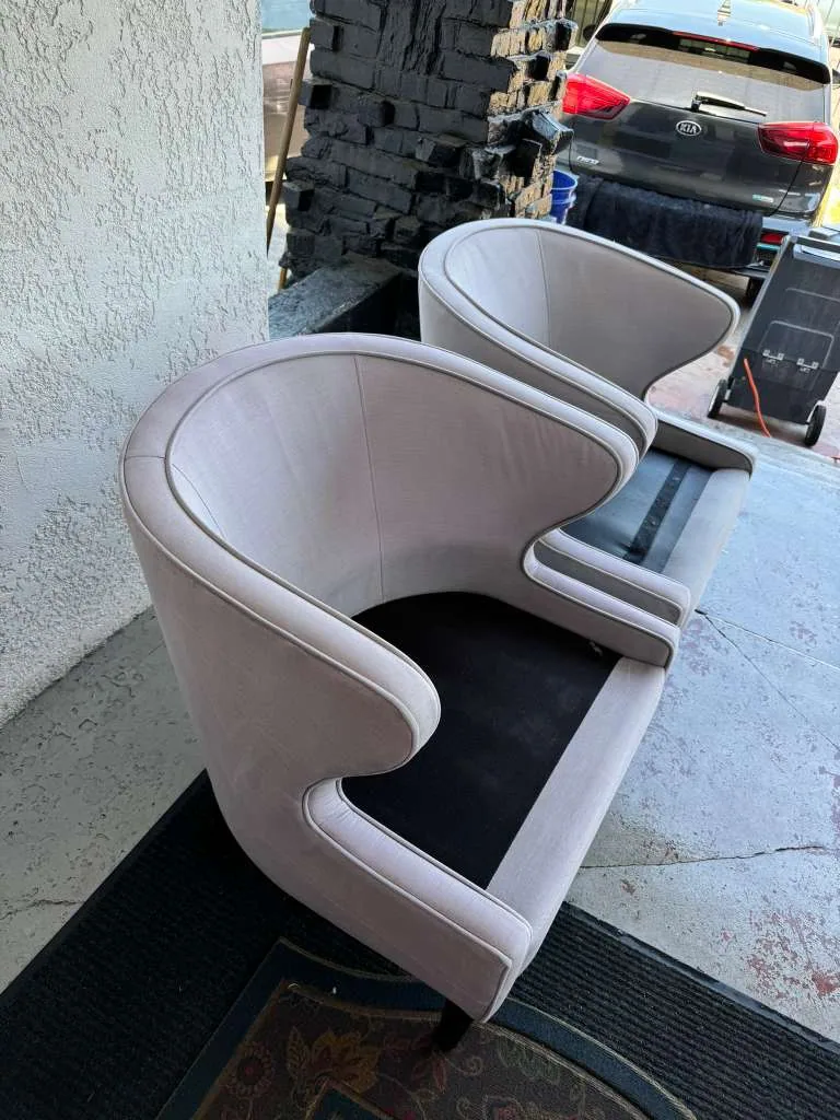 Blush barrel accent chairs cleaned outside a home
