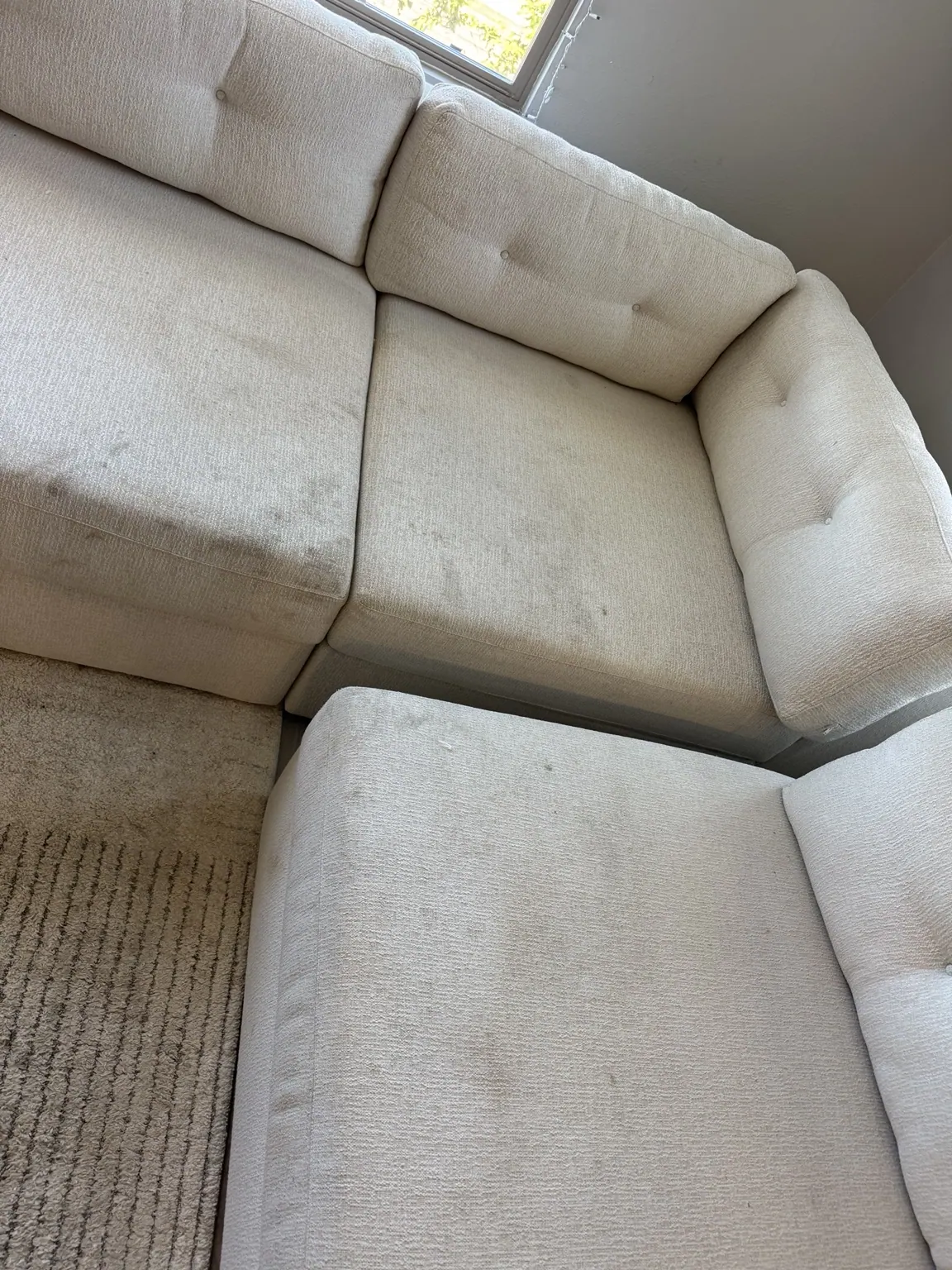 Cream sectional sofa cleaned by Go4Cleaning