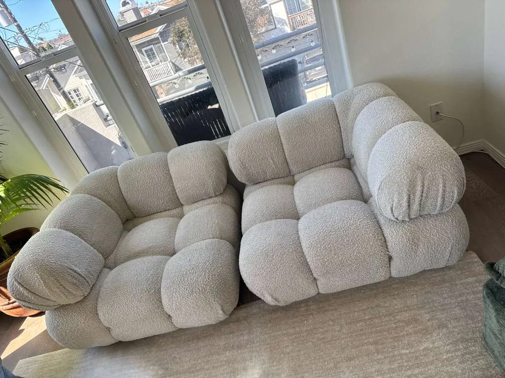Cream boucle bubble-style sofa cleaned in a sunlit living room