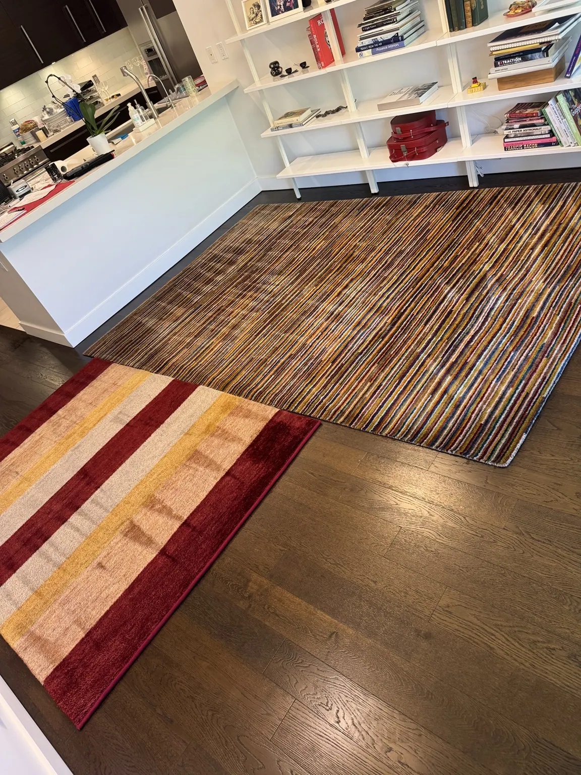 Striped wool area rug cleaned on hardwood