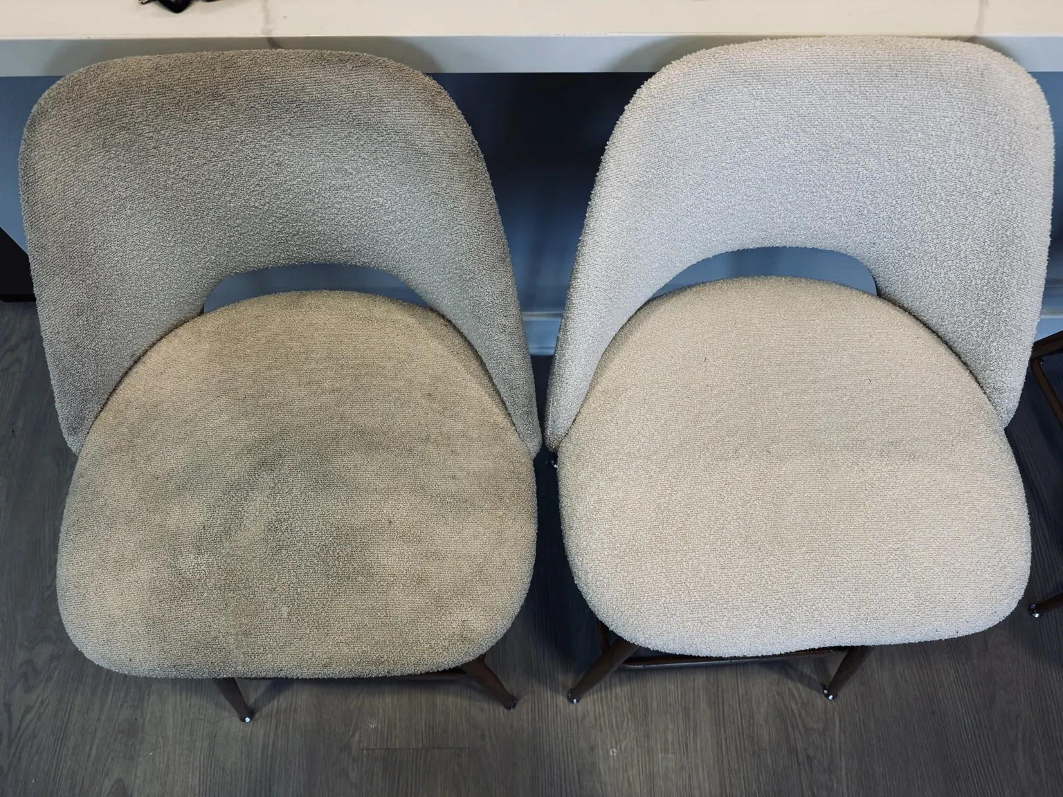 Pair of boucle chairs cleaned side by side