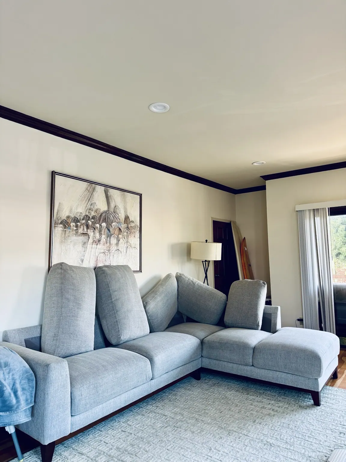 Gray sectional sofa cleaned in a living room