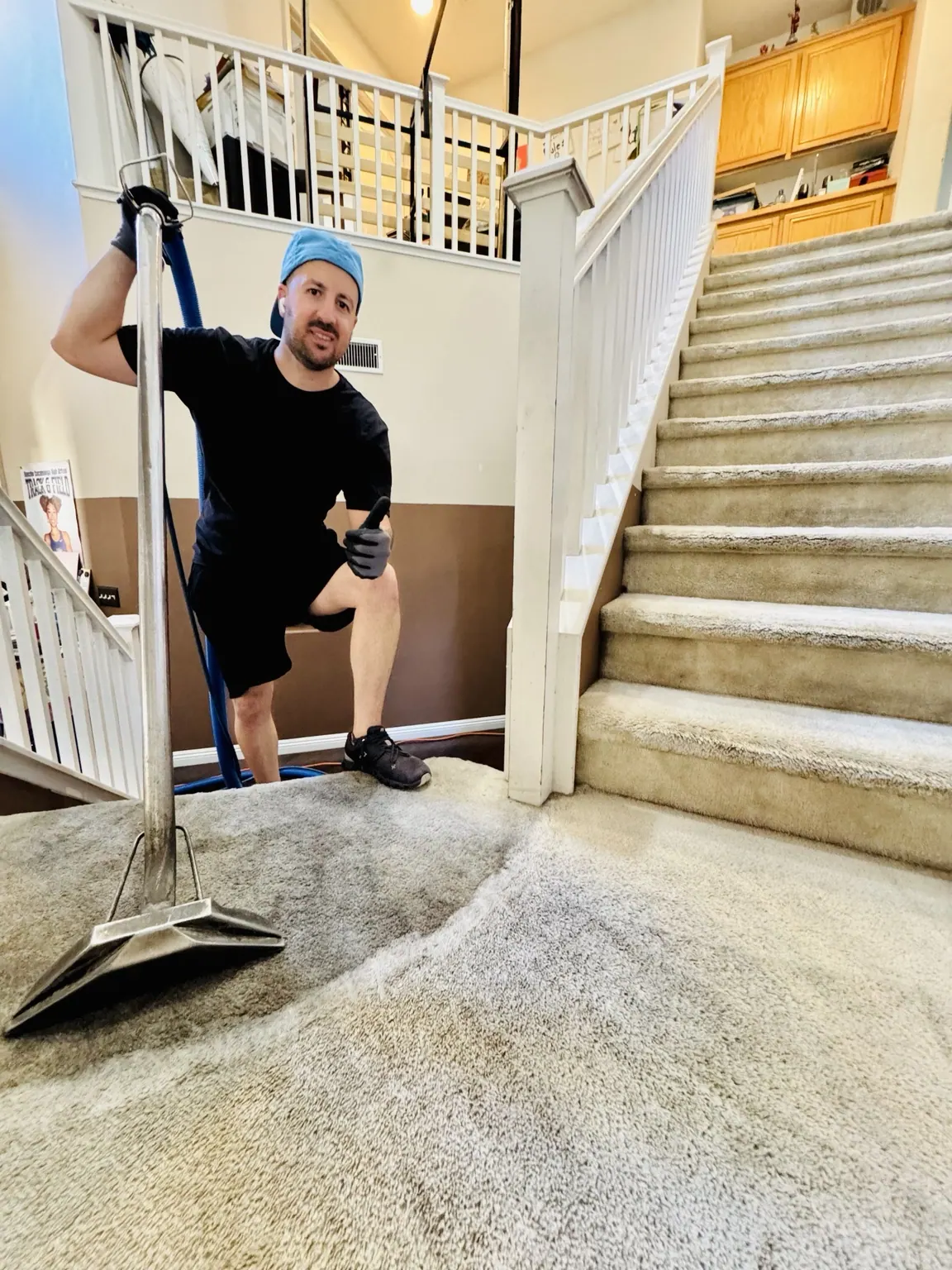 Go4Cleaning technician cleaning carpeted stairs